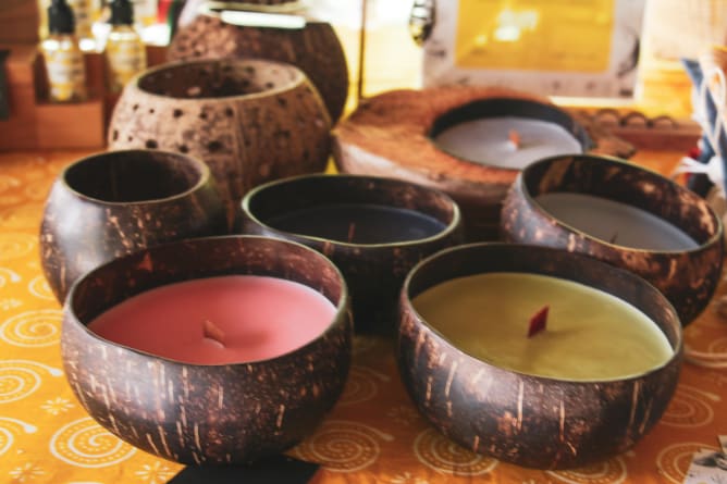 Soy wax candles in coconut shell by COCONESIA, member of LOMBOK ECO FLEA MARKET