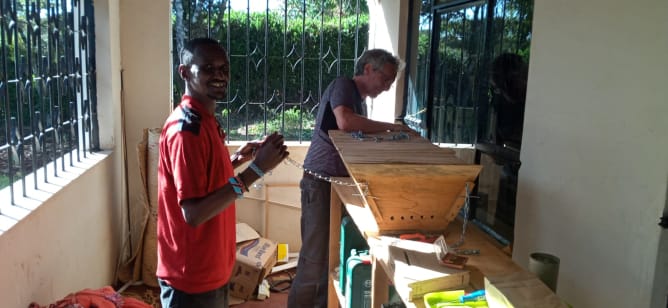 Ali and Norbert preparing  our beehive for mounting