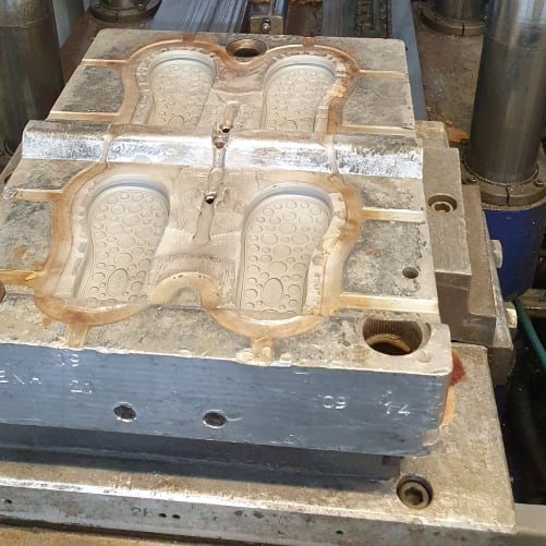 The mold that will go into the press where the material will be injected