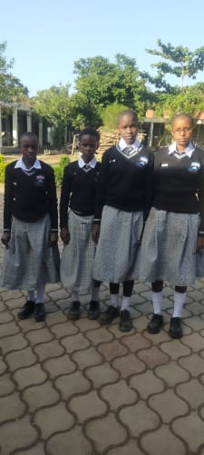 4 maasai girls aged 14-15 y. They hope to get a grant.