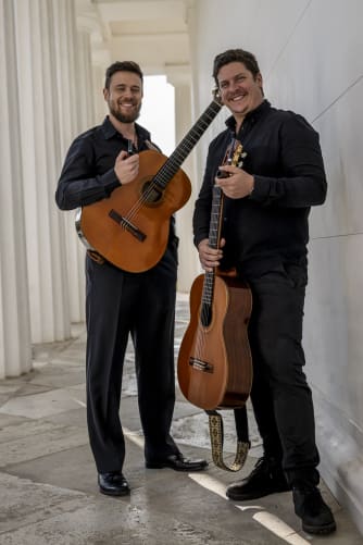 Happy boys with nice guitars 