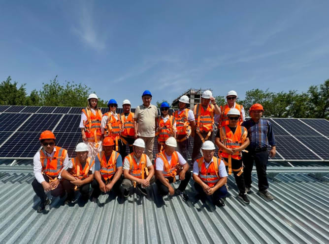 As part of the training, participants visited the rooftop solar plant at KSTU to observe firsthand how the system is installed, managed, and operated