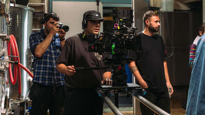 Camera crew filming a scene on location in Zurich