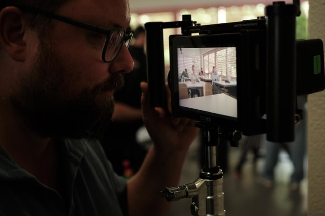 The director monitoring a scene on set during the filming of LATERAL