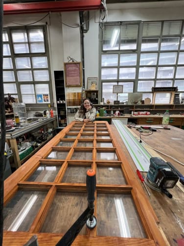 Doors recovered and fully restored to create the glass doors of the telephone booth