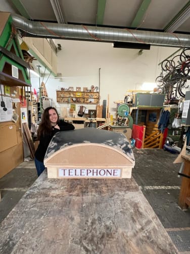 Telephone booth ceiling, dried and curved over several days