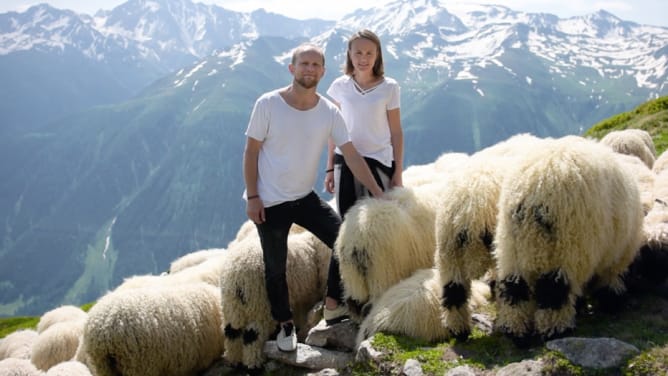 Baabuk Co-founders, Dan & Galina with the Valais Blacknose sheep