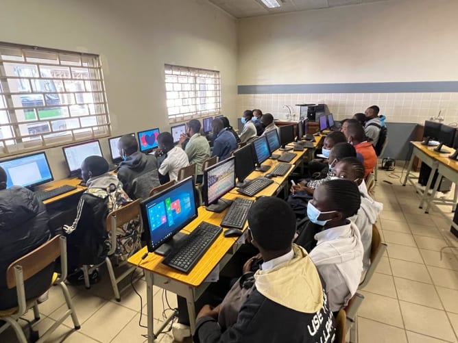 Students learning with computers