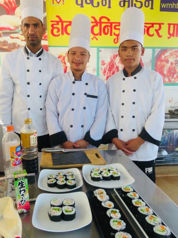 three_boys_infront_of_sushi