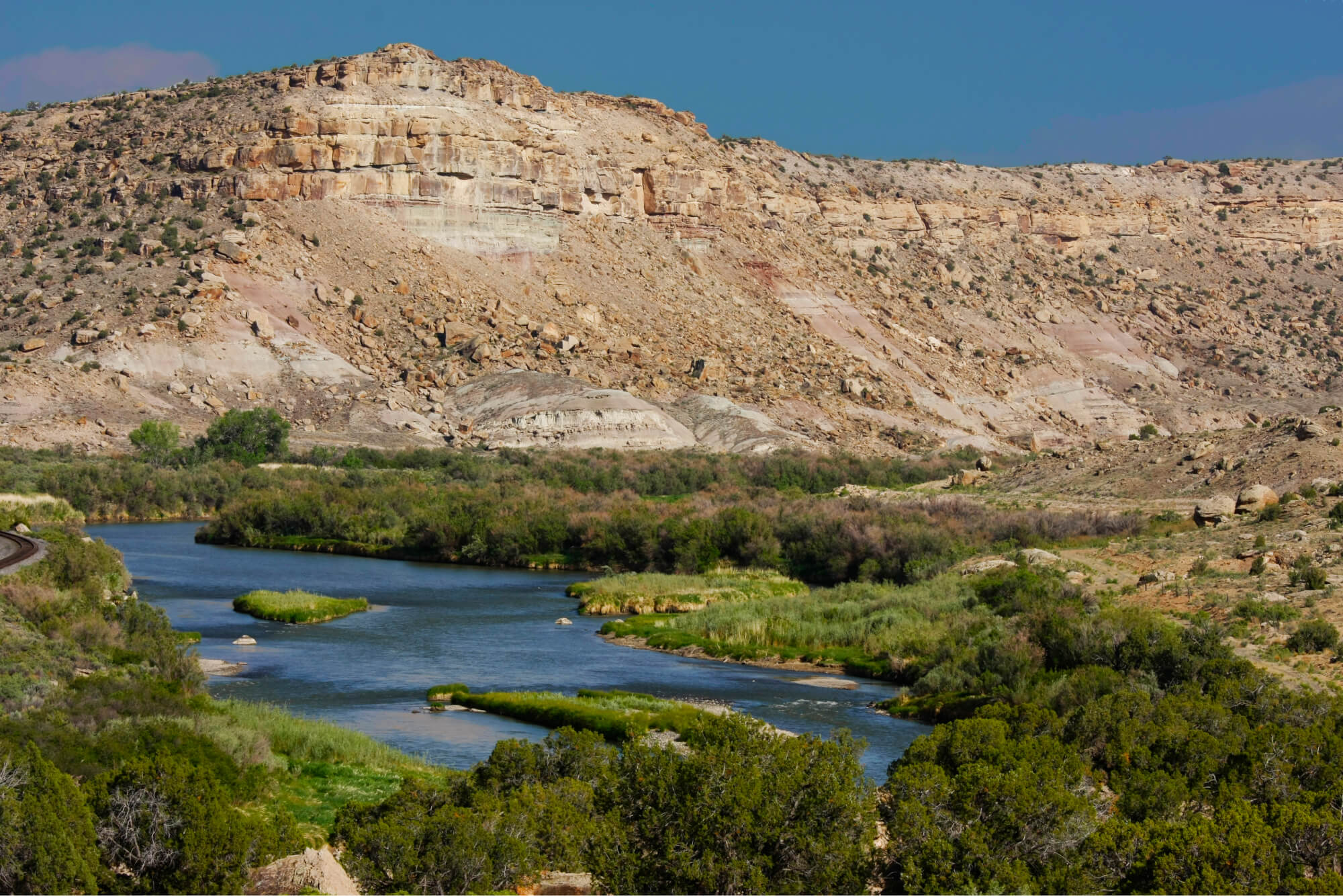 After flowing through some of the country's deepest gorges, the Gunnison River widens and slows as it winds across the Uncompahgre Plateau before joining the Colorado River.