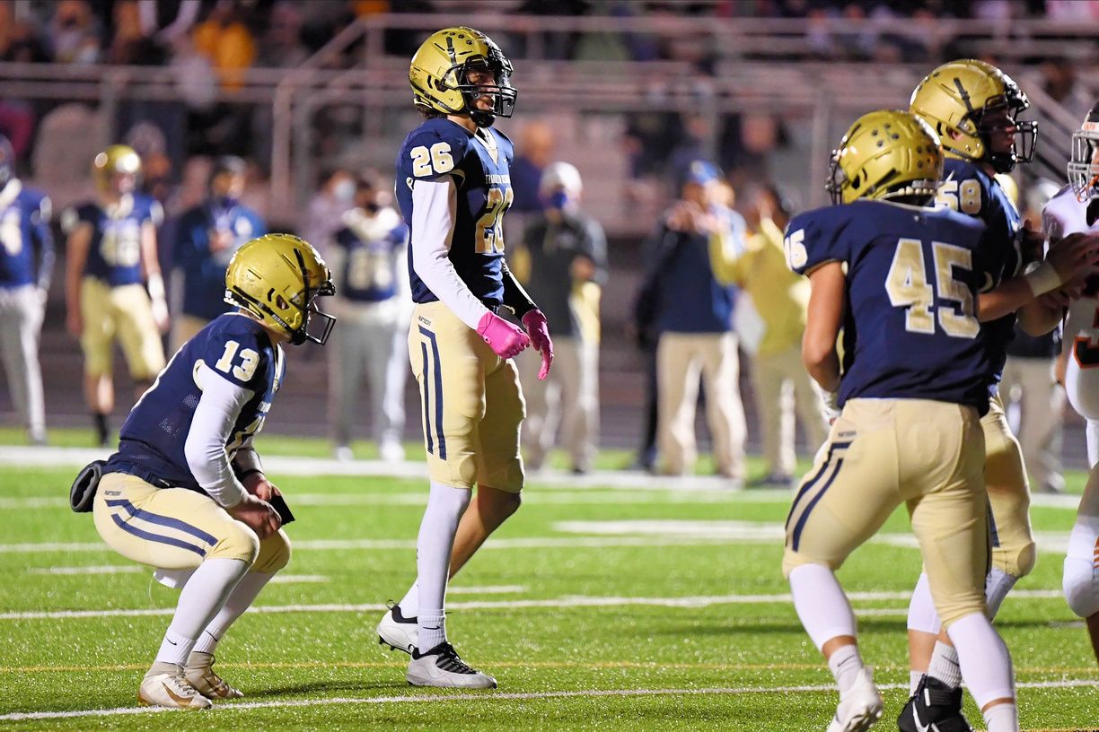 Caden Smith intercepted three passes, returning one for a touchdown, in the Panthers win over Plum. (Photo by www.westernpasports.com)