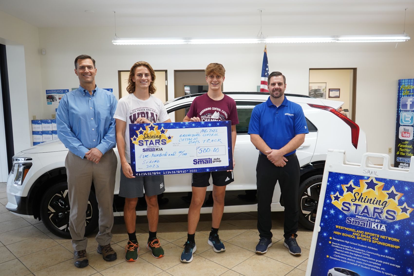 Pictured From L-R: Coach Mike Brewer, James Brewer, Grant Brewer, Jeff Mikell (Smail Kia)
