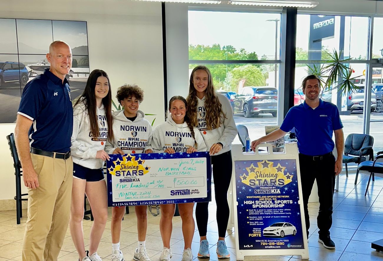 Pictured From L-R: Coach Brian Brozeski, Ava Kobus, Kendall Williams, Bailey Snowberger, Lauren Palangio, Jeff Mikell (Smail Kia)