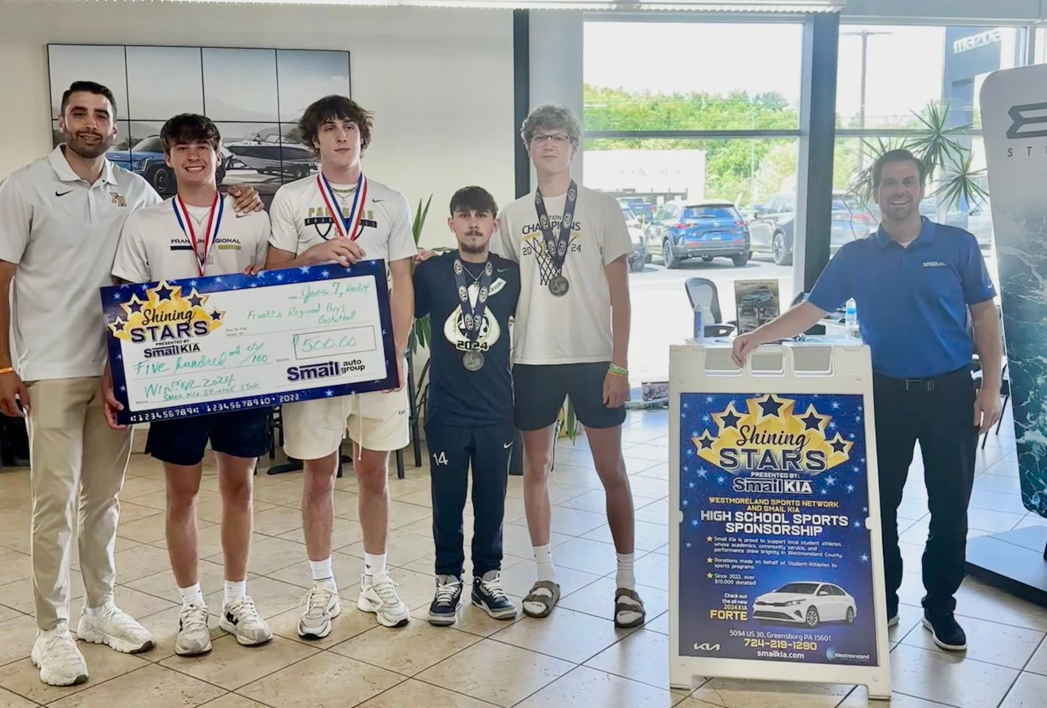 Pictured From L-R: Coach Jesse Reed, Finn Hutchison, Cam Rowell, Zach Bluemling, Colin Masten, Jeff Mikell (Smail Kia)