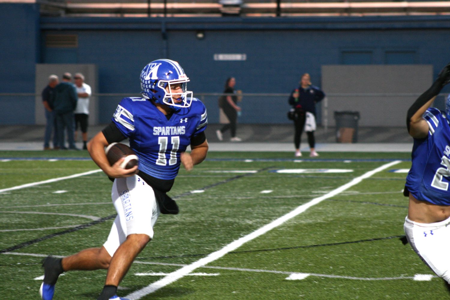 Dom Detruf threw a touchdown pass and ran for another in the Spartans 34-28 win over Norwin. (Photo by Sean Delaney)