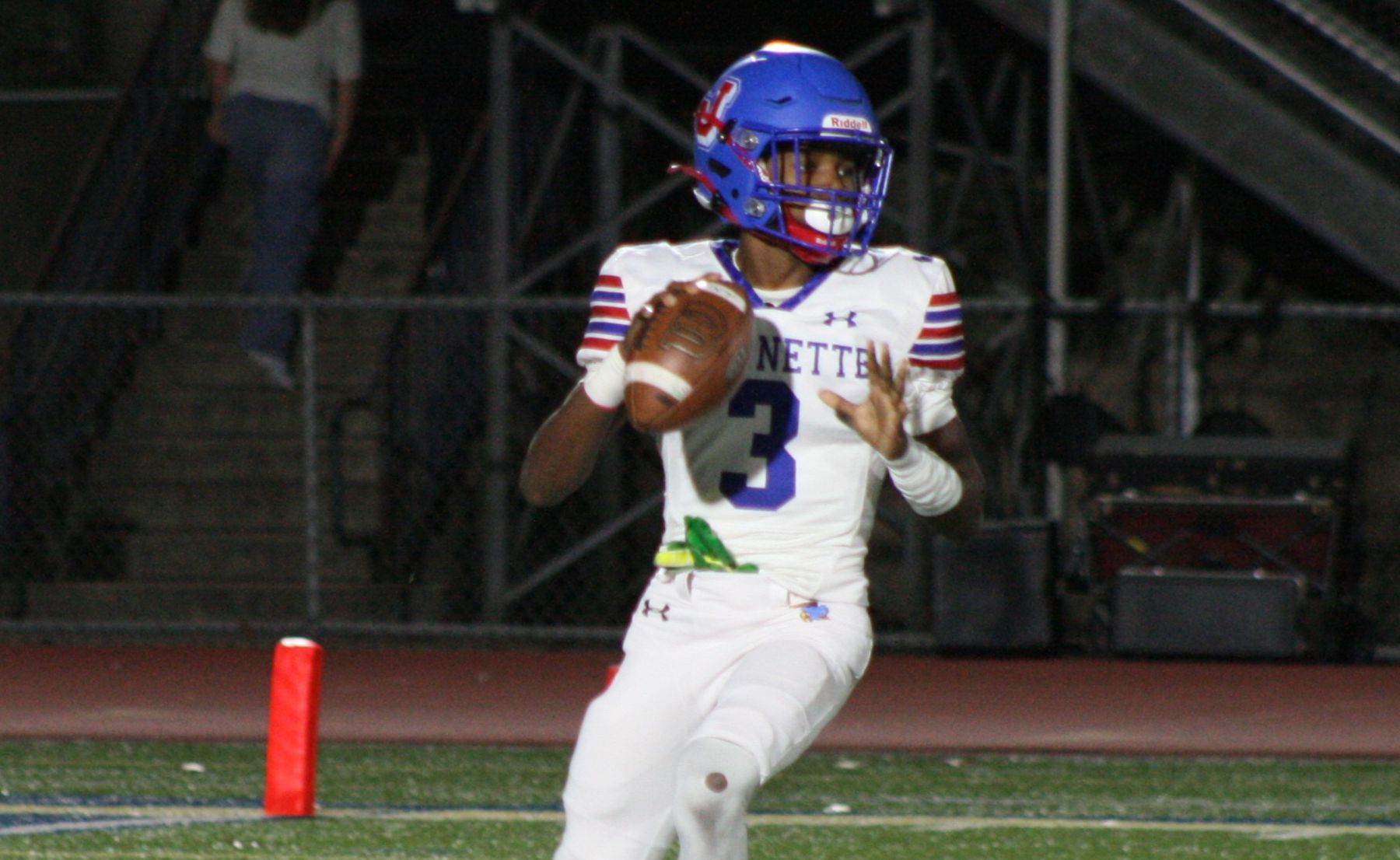 Kymon'e Brown threw for a touchdown and rushed for another to lead Jeannette to a 29-23 win over Greensburg Central Catholic in the Class 1A Quarterfinals. (Photo by Sean Delaney)