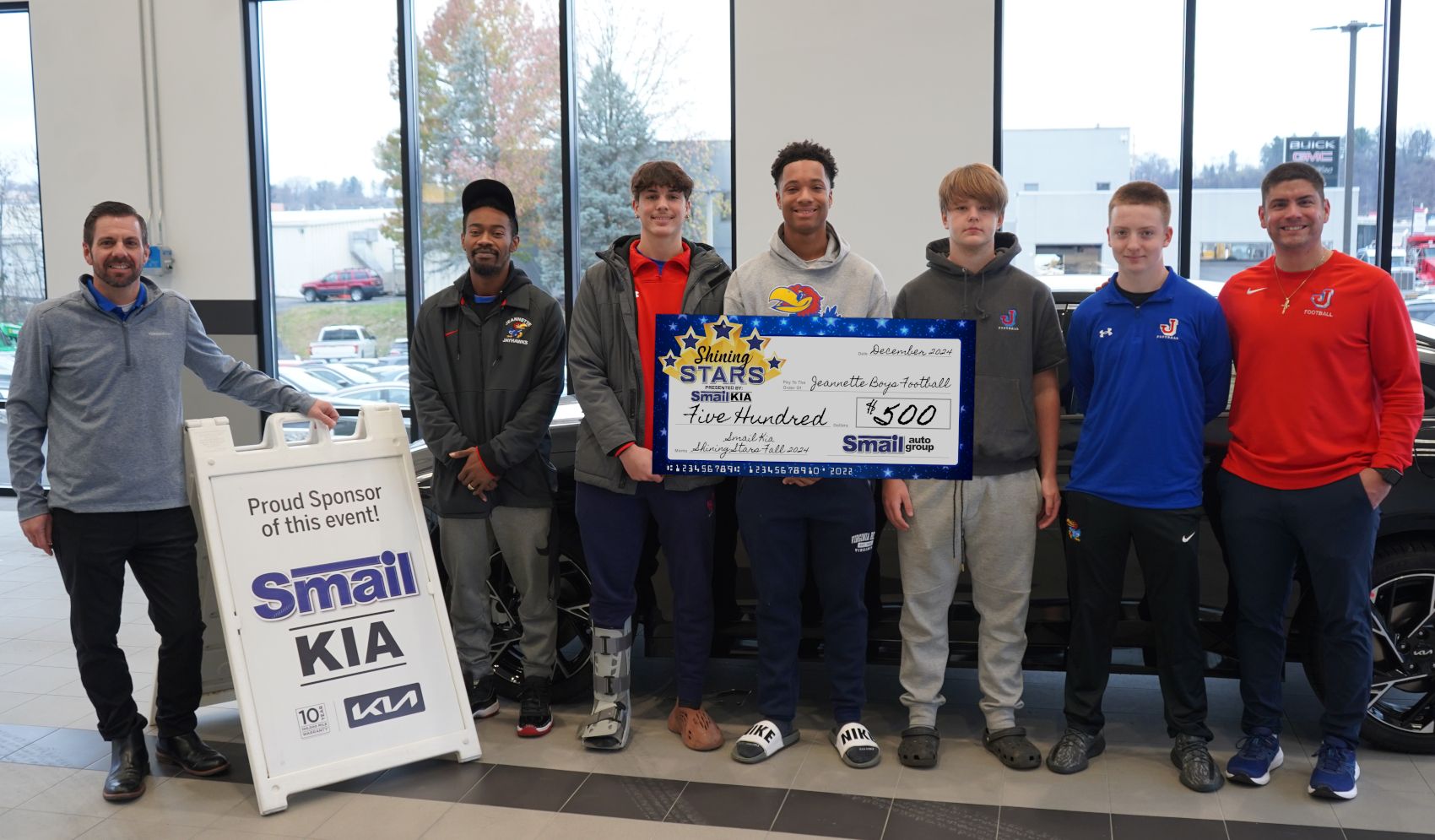 Pictured From L-R: Jeff Mikell (Smail Kia), Coach Darius Brown, McAlister Steele, Noah Sunder, Dane Simmons, Landon Carney, Coach Thomas Paulone