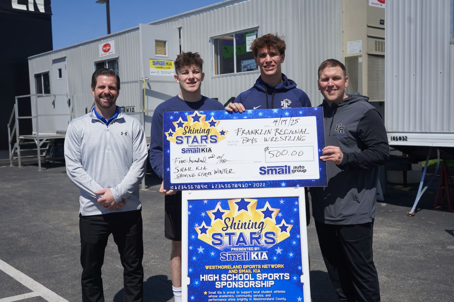 Pictured From L-R: Jeff Mikell (Smail Kia), Henry Patts, Luke Ankney, Coach Matt Lebe.