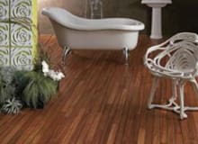 Can I install real wood floor in my bathroom?