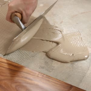 Close up of adhesive being applied