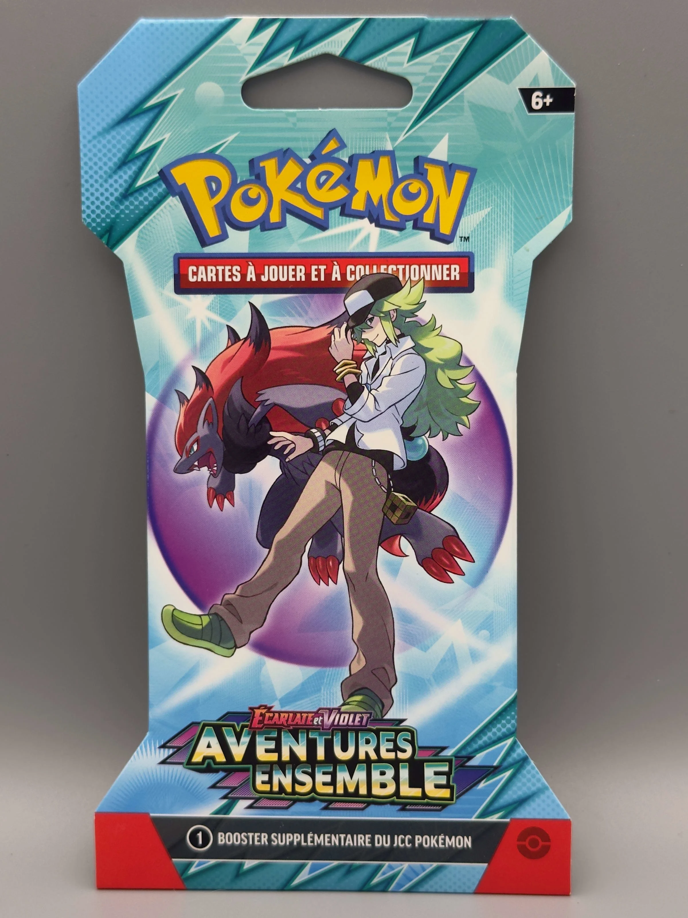 Booster blister Aventures Ensemble, illustration de N et Zoroark