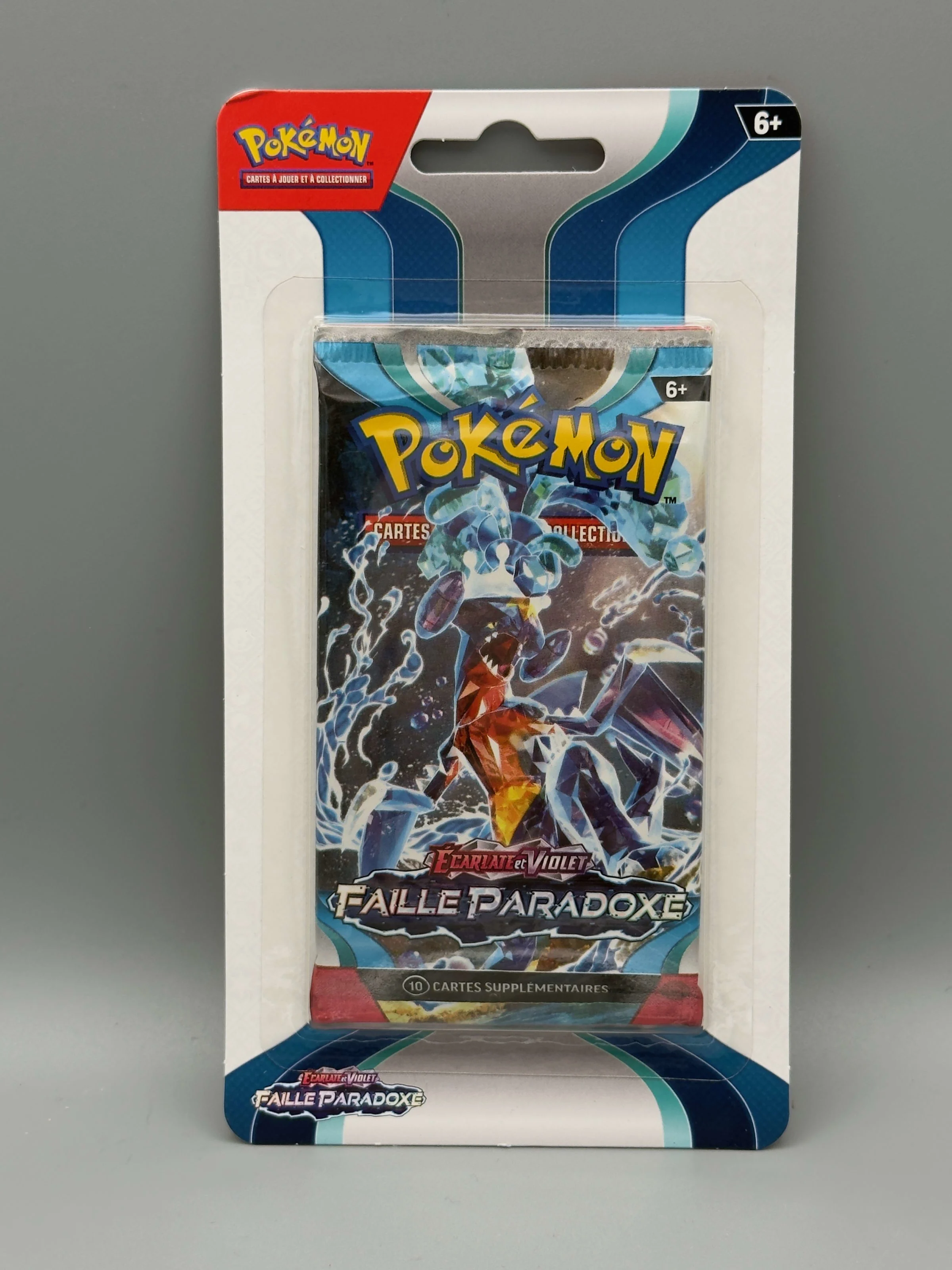 Booster blister Faille Paradoxe Crépusculaire, illustration Carchacrok