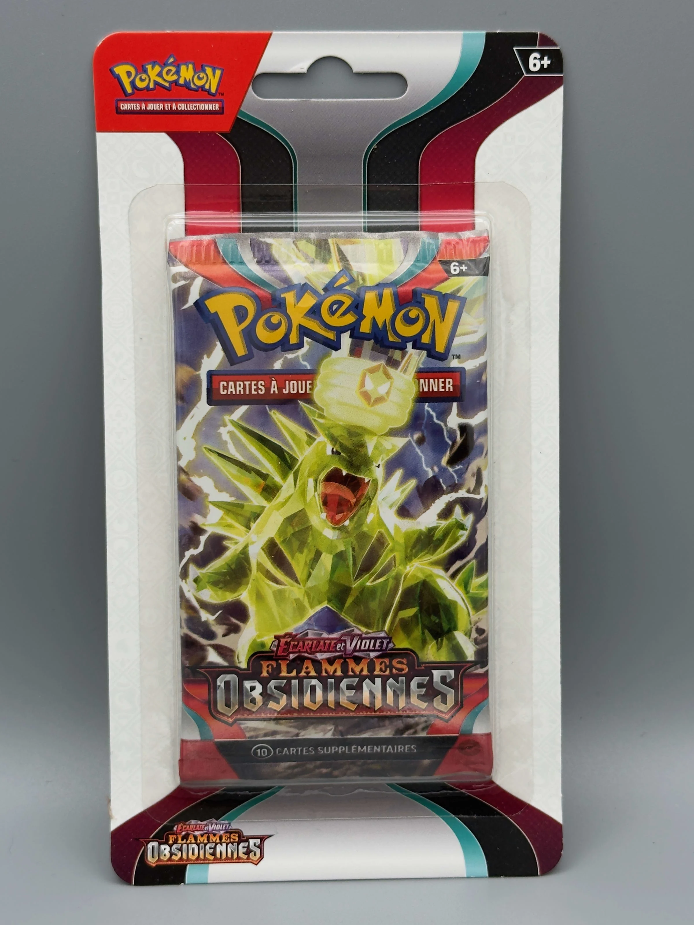Booster blister Flammes Obsidiennes, illustration Tyranocif