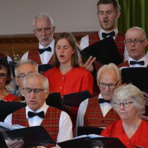 Karlotta Hartz performing in the soprano section of the Lyric Singers' Choir. Karlotta Hartz performing in the soprano section of the Lyric Singers' Choir.