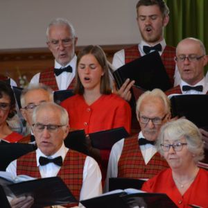 Karlotta Hartz performing in the soprano section of the Lyric Singers' Choir.