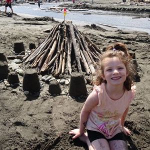 Lauren Hunter, 6, with her sandcastle.  Photo / Supplied.