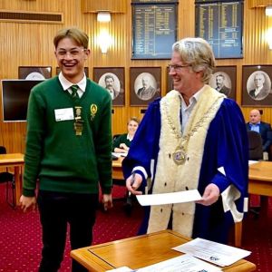 Newly appointed member, Jacob Brown congratulated by Mayor Hamish McDouall at Whanganui District Council.