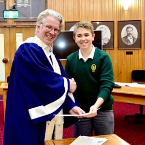 Newly appointed member, Myles Simpson congratulated by Mayor Hamish McDouall at Whanganui District Council.