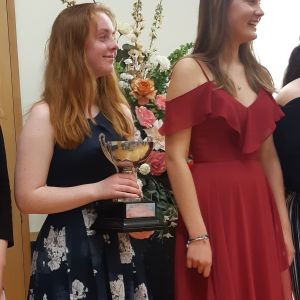 Alyssa with her winning trophy and Eve coming 2nd at prizegiving evening.