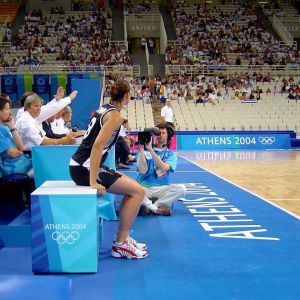Megan Compain waits on the subs bench at the 2004 Athens Olympics. Photo: supplied. Megan Compain waits on the subs bench at the 2004 Athens Olympics. Photo: supplied.