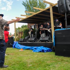 Cloudy weather and occasional rain didn't stop keen concert-goers dancing to the music. Photo / Lewis Gardner.