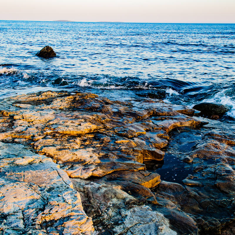 rocks and water at seawall