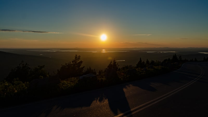 sunset over the road