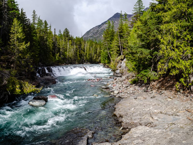 a waterfall along mcdonald creek