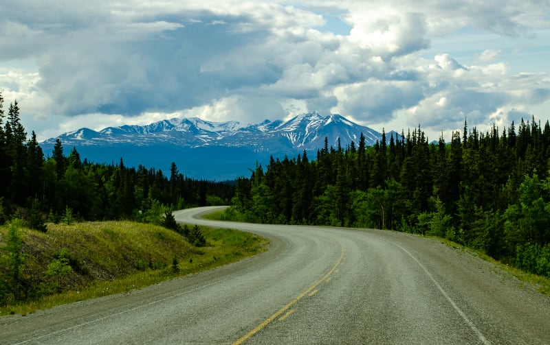 road winding towards the mountains