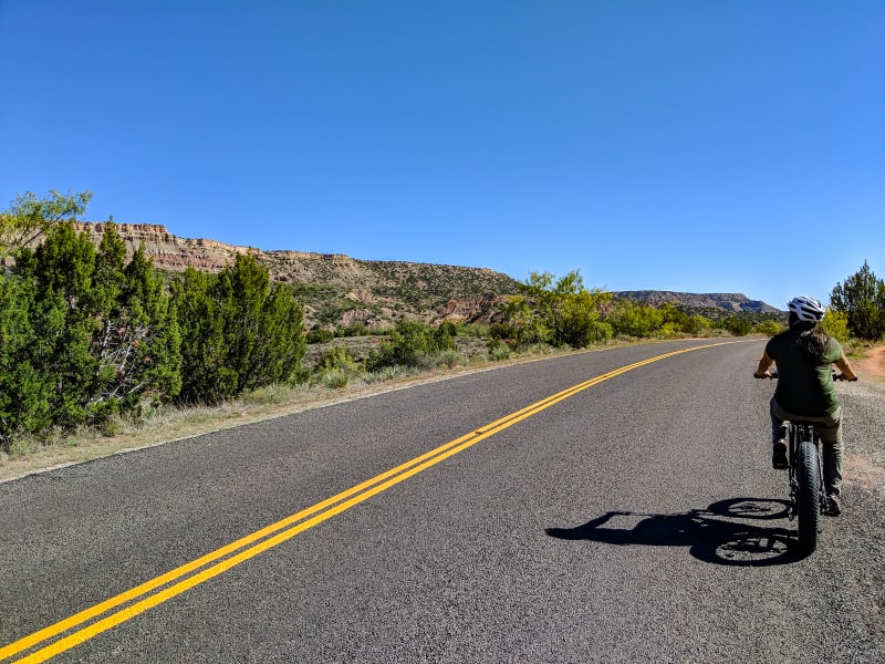 sushila riding her bike on the park loop road