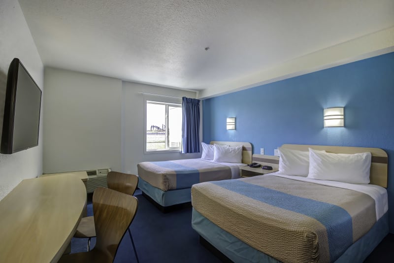 Designed for comfort and convenience, our room with two double-size beds is ideal for traveling together.
