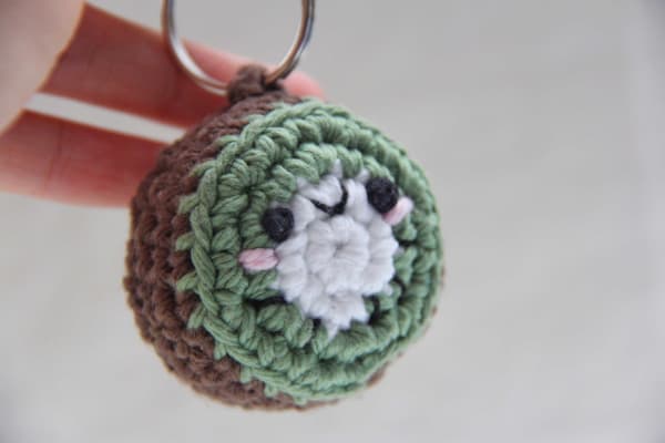 Hi there! This adorable kiwi keychain is handmade with lots of love, and is sure to be the kiwi to YOUR heart! 😉 Whether it's for you or someone special you know, he will be sure to bring you a smile :)

🥝 Made using 100% cotton yarn and filled using fiber-fill stuffing
🥝 Dimensions: 1.75 in x 1.75 in x 1.25 in, with 2 in. long keychain

Please note because items are handmade, sizes may vary between order to order. Thank you! :)