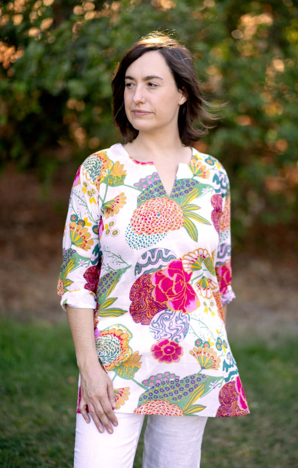Garden Tunic
A customer favorite, the airy cotton tunic can dress up your go to jeans and leggings with its flattering fit and fun prints. Designed with a relaxed fit, this tunic features three-quarter length sleeves, split v-neck, and side slits at the hemline for easy movement.