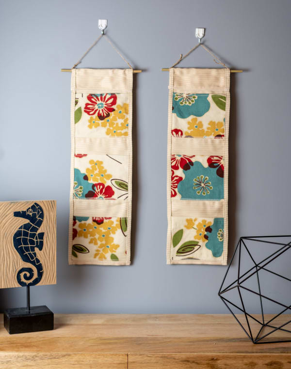 Check out these beautiful wall organizers made from UpCycled Home Decor Fabric. 