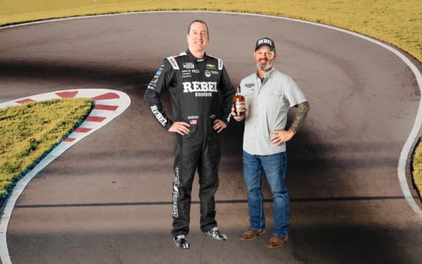 Rebel Bourbon Stays in the Fast Lane With RCR
