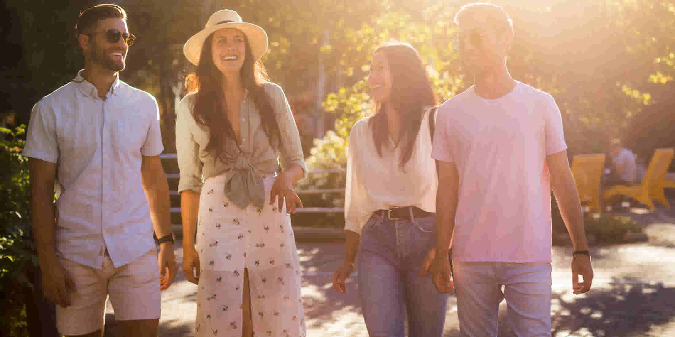 Two couples walking on the Whistler Village Stroll in British Columbia, Canada