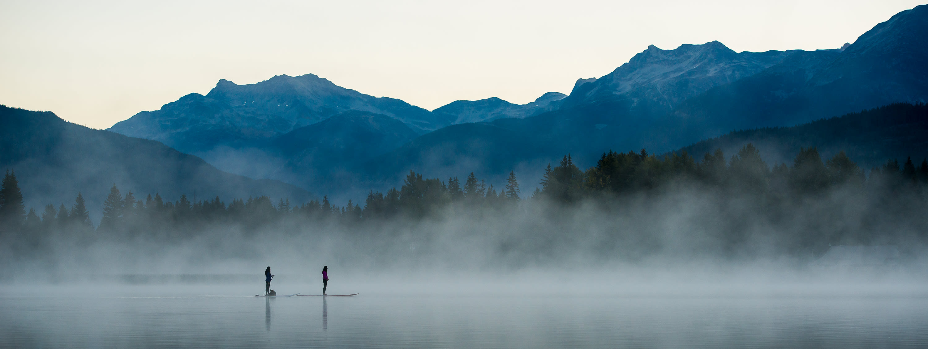 Whistler locals paddleboarding on Alta Lake