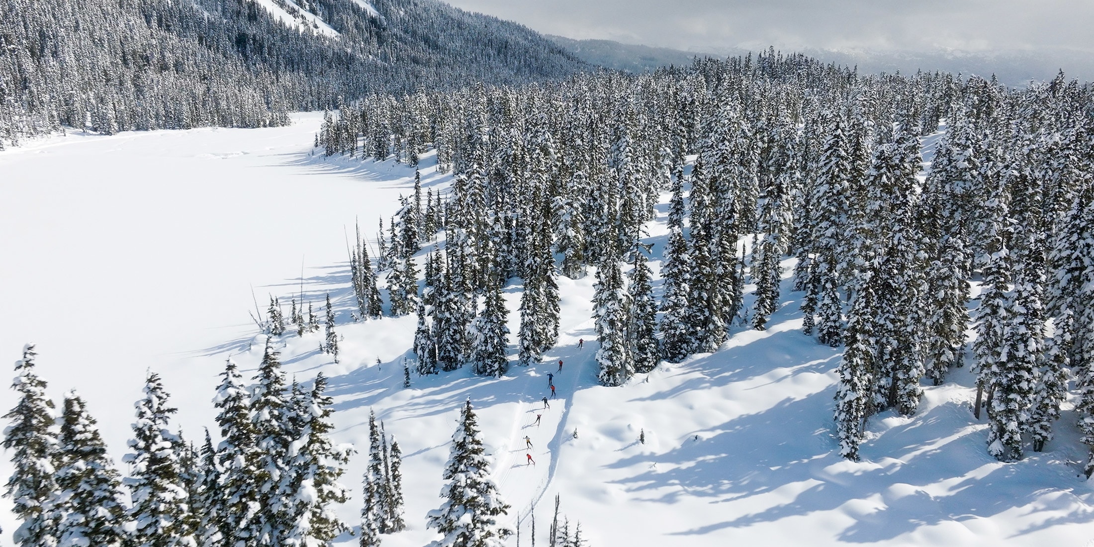 Two people skate skiing in The Callaghan in Whistler BC