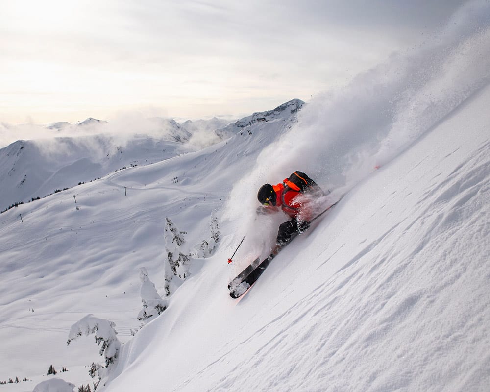 A skier and instructor in a ski lesson on Whistler Blackcomb