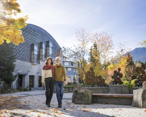 A couple outside Maury Young Arts Centre in the Village